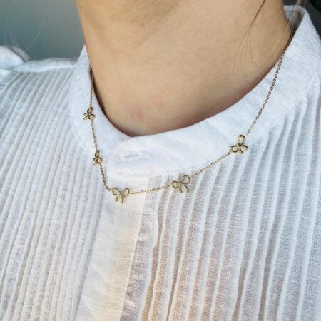 Strikjes ketting Goud